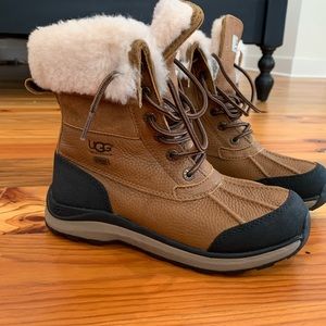 UGG waterproof boots. Only worn 1 time for about an hour, like new condition.
